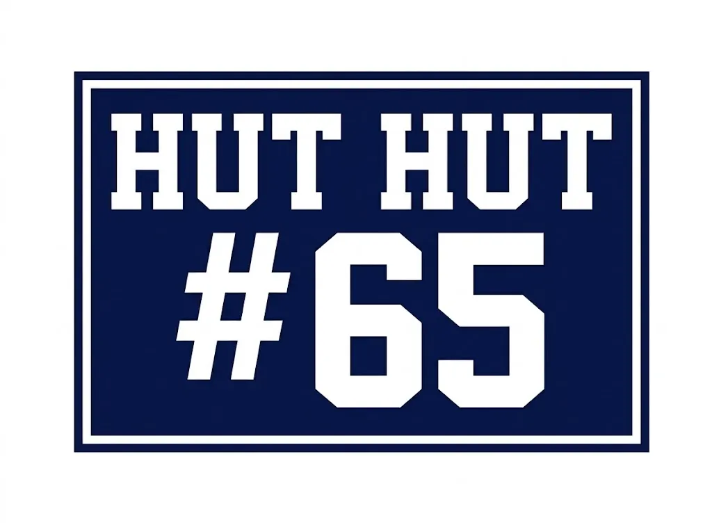 Navy and white football sign that says Hut Hut #65.